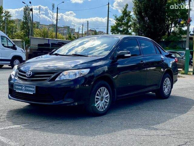 Черный Тойота Королла, объемом двигателя 1.3 л и пробегом 43 тыс. км за 10900 $, фото 1 на Automoto.ua