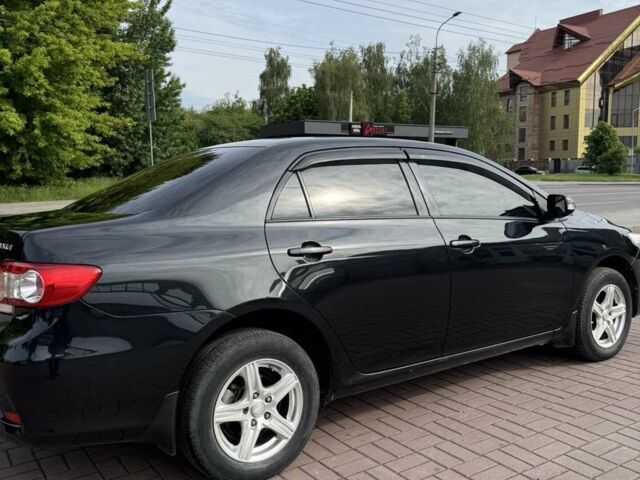 Чорний Тойота Королла, об'ємом двигуна 1.33 л та пробігом 238 тис. км за 9500 $, фото 1 на Automoto.ua