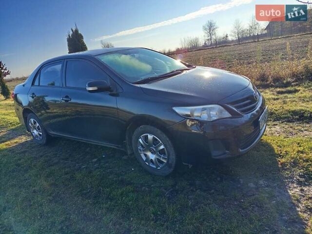 Черный Тойота Королла, объемом двигателя 1.3 л и пробегом 224 тыс. км за 6200 $, фото 1 на Automoto.ua