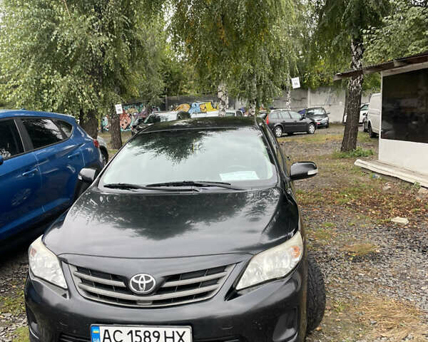 Чорний Тойота Королла, об'ємом двигуна 1.6 л та пробігом 250 тис. км за 8500 $, фото 1 на Automoto.ua