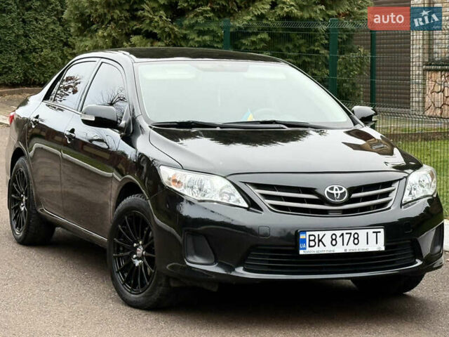 Черный Тойота Королла, объемом двигателя 1.4 л и пробегом 235 тыс. км за 7350 $, фото 1 на Automoto.ua