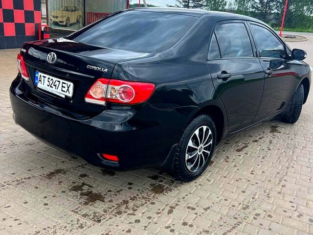 Черный Тойота Королла, объемом двигателя 1.3 л и пробегом 220 тыс. км за 6100 $, фото 1 на Automoto.ua