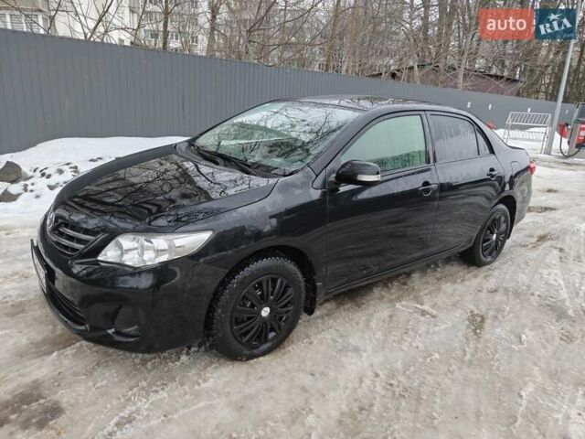 Чорний Тойота Королла, об'ємом двигуна 1.6 л та пробігом 110 тис. км за 9200 $, фото 1 на Automoto.ua