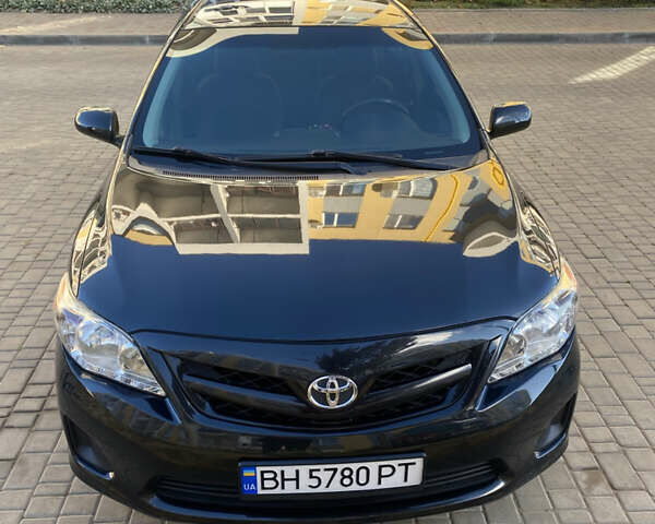 Черный Тойота Королла, объемом двигателя 1.8 л и пробегом 299 тыс. км за 10500 $, фото 1 на Automoto.ua