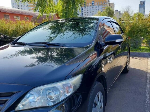 Чорний Тойота Королла, об'ємом двигуна 1.33 л та пробігом 250 тис. км за 8500 $, фото 1 на Automoto.ua