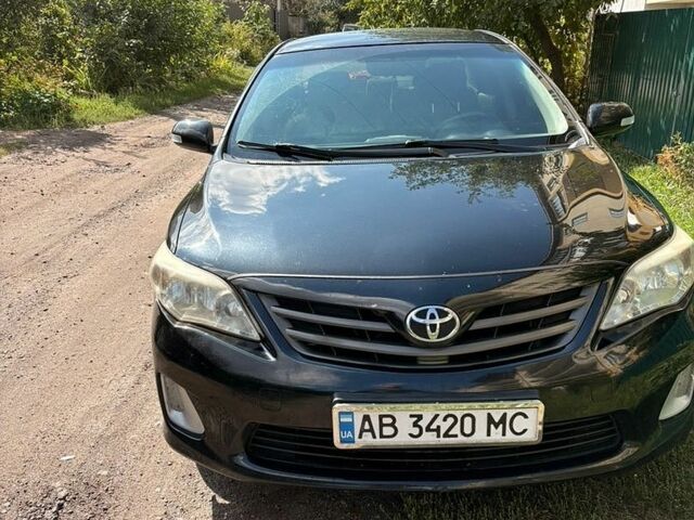 Черный Тойота Королла, объемом двигателя 1.33 л и пробегом 231 тыс. км за 6100 $, фото 1 на Automoto.ua