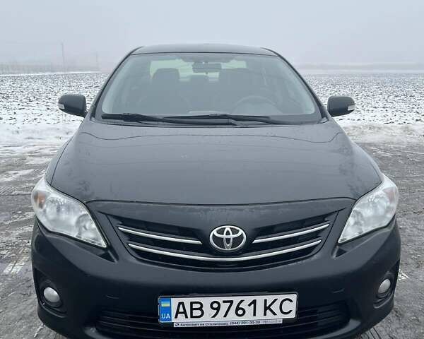 Чорний Тойота Королла, об'ємом двигуна 1.6 л та пробігом 134 тис. км за 9400 $, фото 1 на Automoto.ua