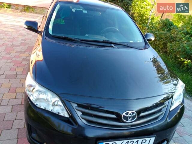Черный Тойота Королла, объемом двигателя 1.33 л и пробегом 210 тыс. км за 6300 $, фото 1 на Automoto.ua