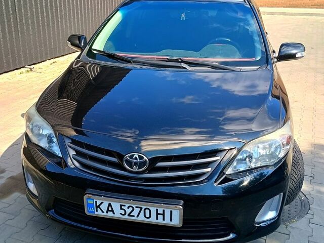 Черный Тойота Королла, объемом двигателя 1.3 л и пробегом 210 тыс. км за 6400 $, фото 1 на Automoto.ua