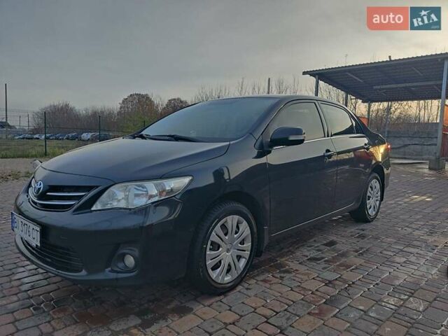 Черный Тойота Королла, объемом двигателя 1.6 л и пробегом 244 тыс. км за 8400 $, фото 1 на Automoto.ua
