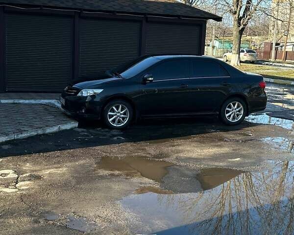 Черный Тойота Королла, объемом двигателя 1.6 л и пробегом 119 тыс. км за 10333 $, фото 1 на Automoto.ua