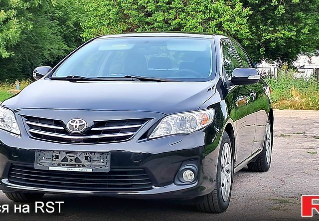 Черный Тойота Королла, объемом двигателя 1.6 л и пробегом 83 тыс. км за 9400 $, фото 1 на Automoto.ua