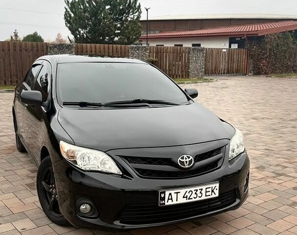 Чорний Тойота Королла, об'ємом двигуна 1.8 л та пробігом 113 тис. км за 8800 $, фото 1 на Automoto.ua