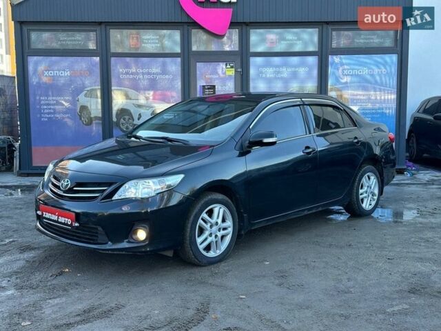 Чорний Тойота Королла, об'ємом двигуна 1.6 л та пробігом 134 тис. км за 10000 $, фото 1 на Automoto.ua