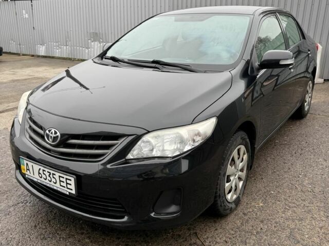 Черный Тойота Королла, объемом двигателя 1.3 л и пробегом 176 тыс. км за 7955 $, фото 1 на Automoto.ua