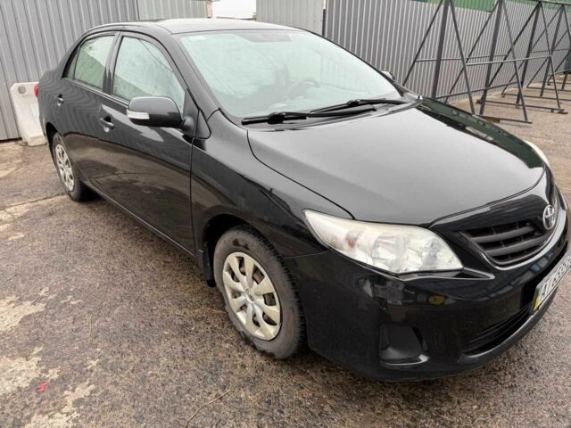 Черный Тойота Королла, объемом двигателя 1.33 л и пробегом 175 тыс. км за 6800 $, фото 1 на Automoto.ua