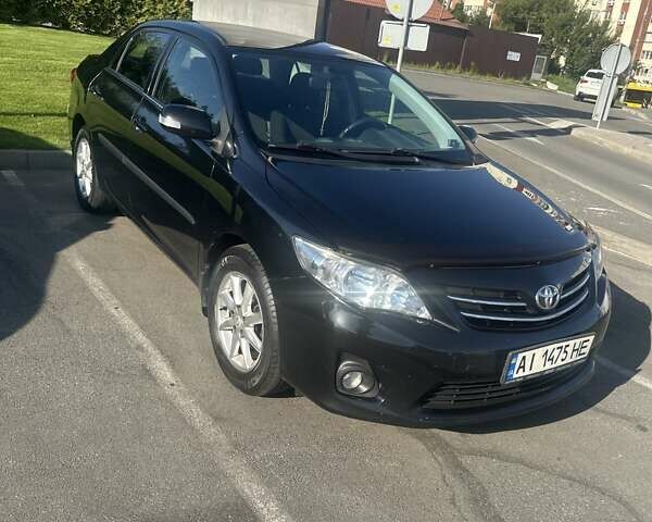 Черный Тойота Королла, объемом двигателя 1.6 л и пробегом 298 тыс. км за 9700 $, фото 1 на Automoto.ua