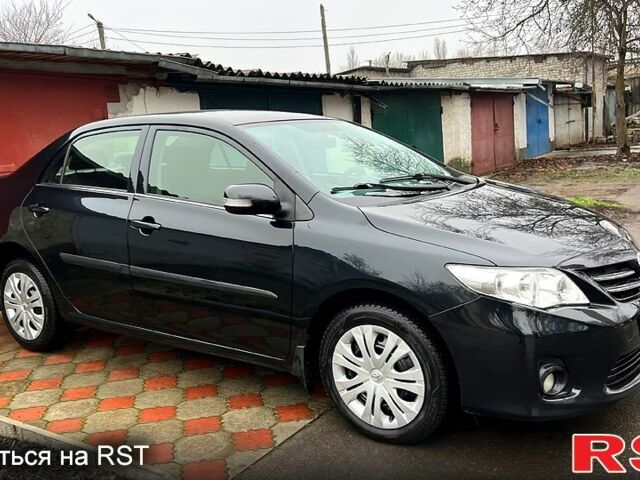 Черный Тойота Королла, объемом двигателя 1.6 л и пробегом 83 тыс. км за 10800 $, фото 1 на Automoto.ua