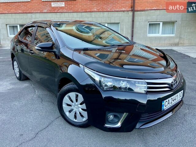Чорний Тойота Королла, об'ємом двигуна 1.6 л та пробігом 113 тис. км за 12350 $, фото 1 на Automoto.ua