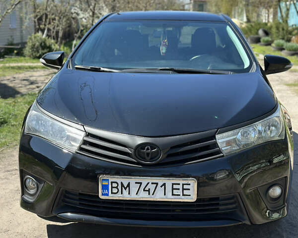 Чорний Тойота Королла, об'ємом двигуна 1.33 л та пробігом 219 тис. км за 9400 $, фото 1 на Automoto.ua