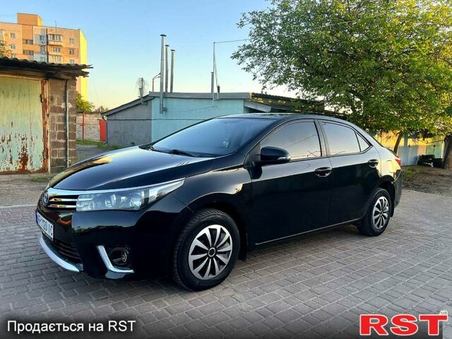 Черный Тойота Королла, объемом двигателя 1.3 л и пробегом 214 тыс. км за 7850 $, фото 1 на Automoto.ua