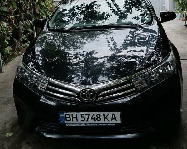 Чорний Тойота Королла, об'ємом двигуна 1.33 л та пробігом 145 тис. км за 11300 $, фото 1 на Automoto.ua