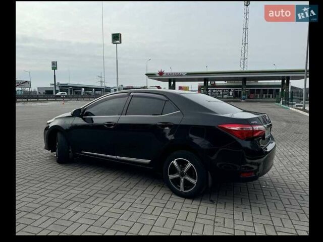 Чорний Тойота Королла, об'ємом двигуна 1.6 л та пробігом 173 тис. км за 11900 $, фото 1 на Automoto.ua