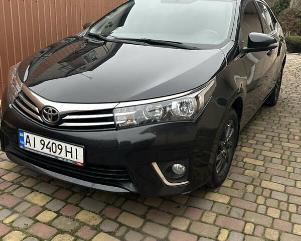 Черный Тойота Королла, объемом двигателя 1.6 л и пробегом 202 тыс. км за 12700 $, фото 1 на Automoto.ua