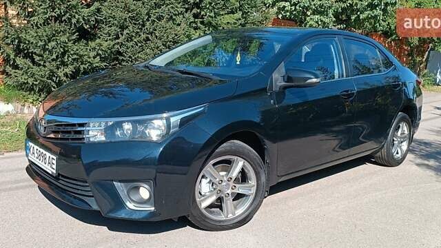 Черный Тойота Королла, объемом двигателя 1.33 л и пробегом 95 тыс. км за 10900 $, фото 1 на Automoto.ua