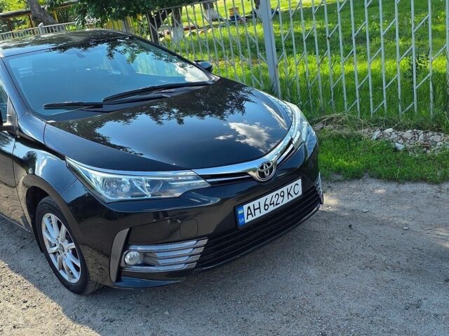 Чорний Тойота Королла, об'ємом двигуна 1.6 л та пробігом 123 тис. км за 13000 $, фото 1 на Automoto.ua