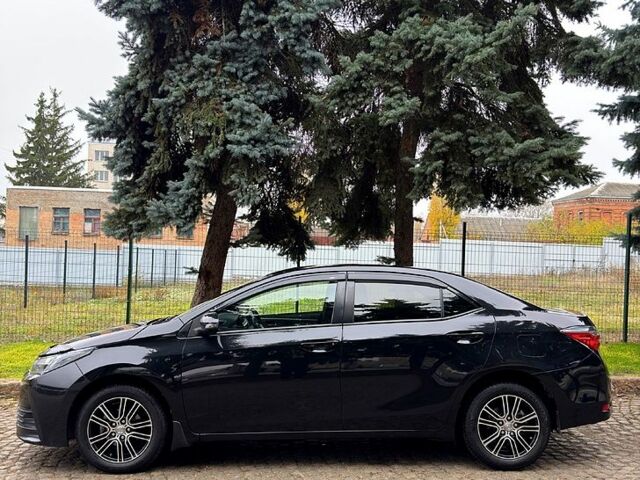 Черный Тойота Королла, объемом двигателя 1.6 л и пробегом 134 тыс. км за 14200 $, фото 1 на Automoto.ua