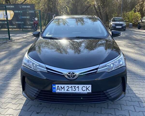 Черный Тойота Королла, объемом двигателя 1.33 л и пробегом 102 тыс. км за 12700 $, фото 1 на Automoto.ua