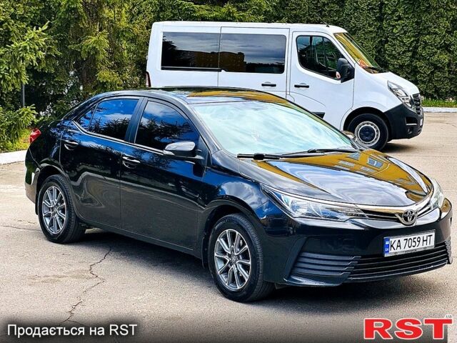 Черный Тойота Королла, объемом двигателя 1.6 л и пробегом 140 тыс. км за 11500 $, фото 1 на Automoto.ua