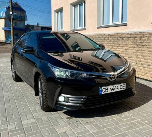 Черный Тойота Королла, объемом двигателя 1.6 л и пробегом 134 тыс. км за 14999 $, фото 1 на Automoto.ua