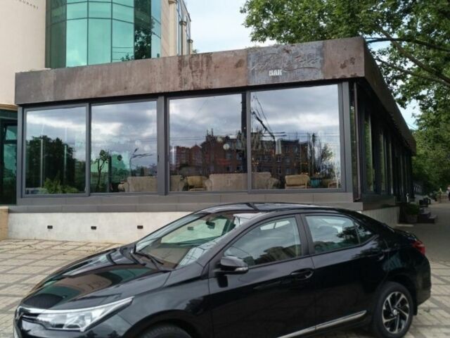 Черный Тойота Королла, объемом двигателя 1.33 л и пробегом 88 тыс. км за 12500 $, фото 1 на Automoto.ua