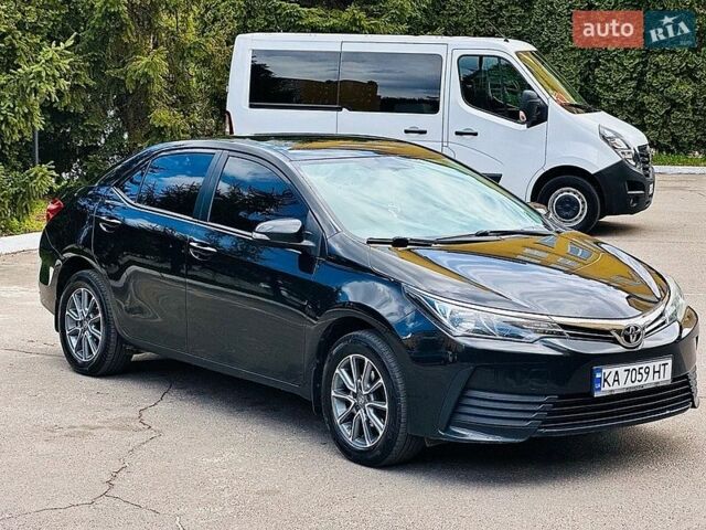 Черный Тойота Королла, объемом двигателя 1.6 л и пробегом 140 тыс. км за 12000 $, фото 1 на Automoto.ua