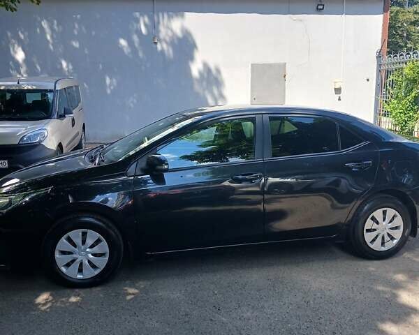 Черный Тойота Королла, объемом двигателя 1.33 л и пробегом 143 тыс. км за 11000 $, фото 1 на Automoto.ua