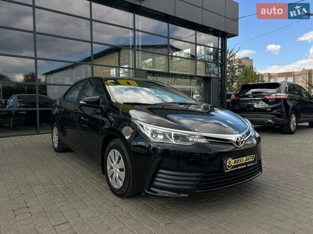 Черный Тойота Королла, объемом двигателя 1.33 л и пробегом 75 тыс. км за 15900 $, фото 1 на Automoto.ua