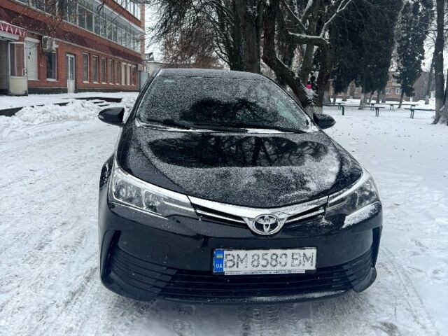 Чорний Тойота Королла, об'ємом двигуна 1.3 л та пробігом 218 тис. км за 9400 $, фото 1 на Automoto.ua