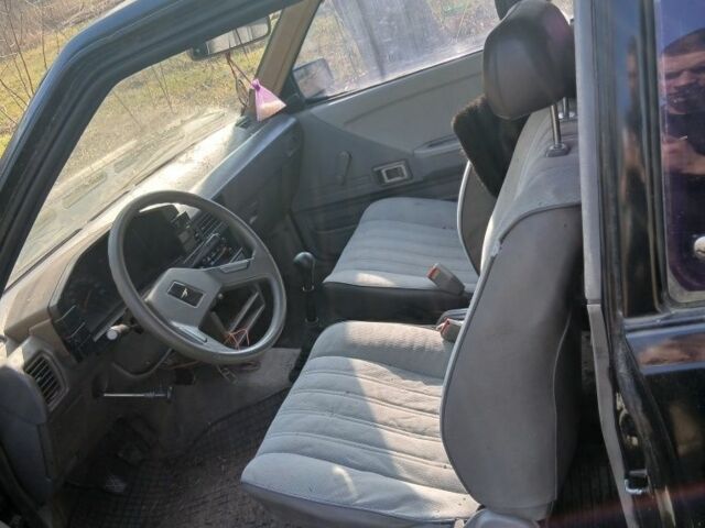 Чорний Тойота Королла, об'ємом двигуна 1.3 л та пробігом 32 тис. км за 271 $, фото 1 на Automoto.ua