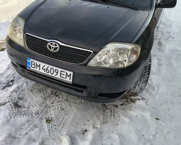 Черный Тойота Королла, объемом двигателя 1.6 л и пробегом 337 тыс. км за 3900 $, фото 1 на Automoto.ua