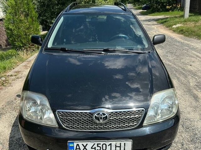 Чорний Тойота Королла, об'ємом двигуна 2 л та пробігом 260 тис. км за 3750 $, фото 1 на Automoto.ua
