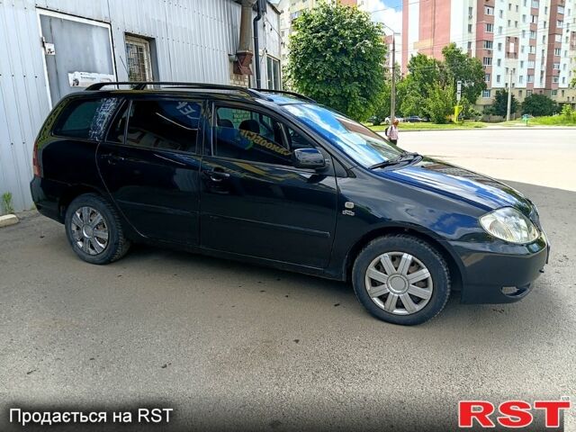 Черный Тойота Королла, объемом двигателя 2 л и пробегом 250 тыс. км за 2999 $, фото 1 на Automoto.ua