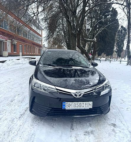 Черный Тойота Королла, объемом двигателя 1.3 л и пробегом 21800 тыс. км за 9400 $, фото 1 на Automoto.ua