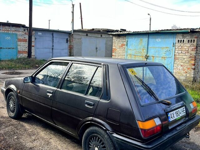 Коричневый Тойота Королла, объемом двигателя 1.3 л и пробегом 100 тыс. км за 850 $, фото 1 на Automoto.ua