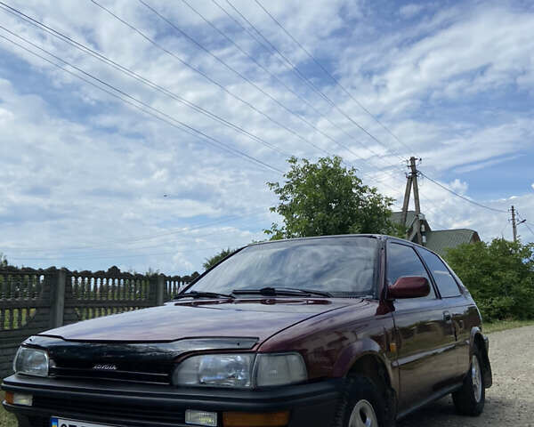 Червоний Тойота Королла, об'ємом двигуна 1.3 л та пробігом 329 тис. км за 2250 $, фото 1 на Automoto.ua