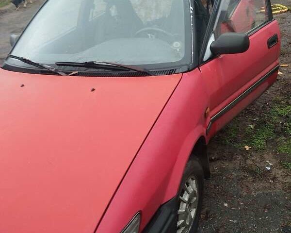 Красный Тойота Королла, объемом двигателя 1.3 л и пробегом 420 тыс. км за 1600 $, фото 1 на Automoto.ua