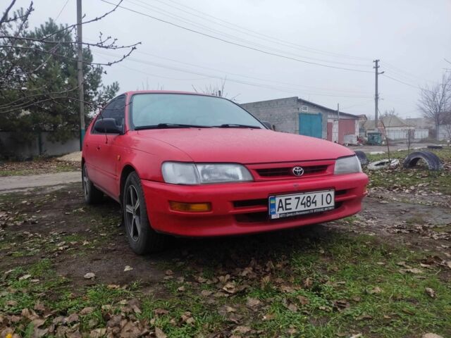 Красный Тойота Королла, объемом двигателя 1.3 л и пробегом 300 тыс. км за 3000 $, фото 1 на Automoto.ua