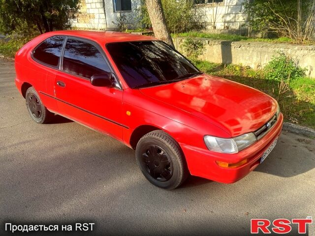 Червоний Тойота Королла, об'ємом двигуна 1.3 л та пробігом 350 тис. км за 2580 $, фото 1 на Automoto.ua