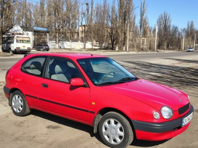 Красный Тойота Королла, объемом двигателя 1.4 л и пробегом 213 тыс. км за 2950 $, фото 1 на Automoto.ua